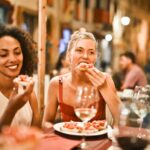 woman eating bruschetta