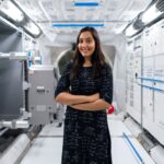 female engineer in space station