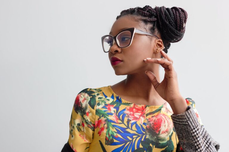 photo of woman wearing yellow floral top