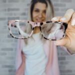 selective focus photography of pink and black framed eyeglasses