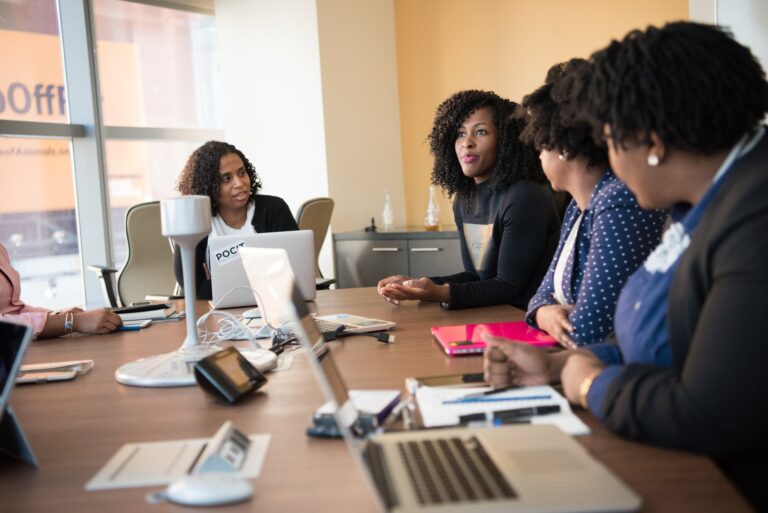 four woman at the conference room