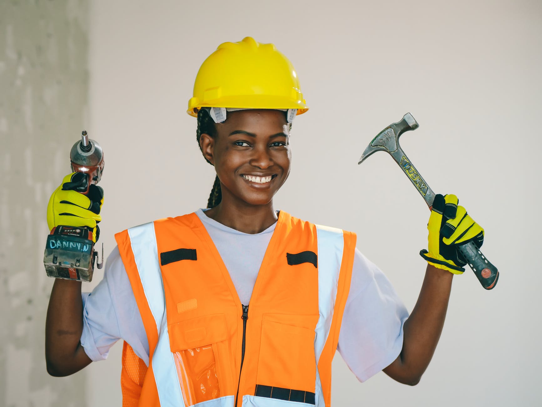 woman in orange reflective vest