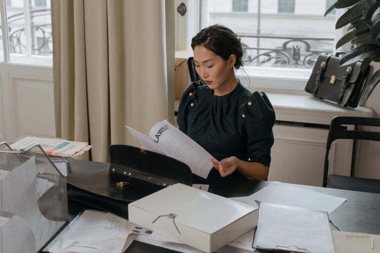 a woman reading a document