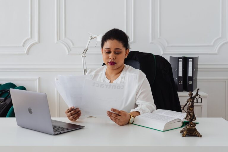 woman at her office looking at the papers