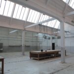 modern interior of spacious empty warehouse