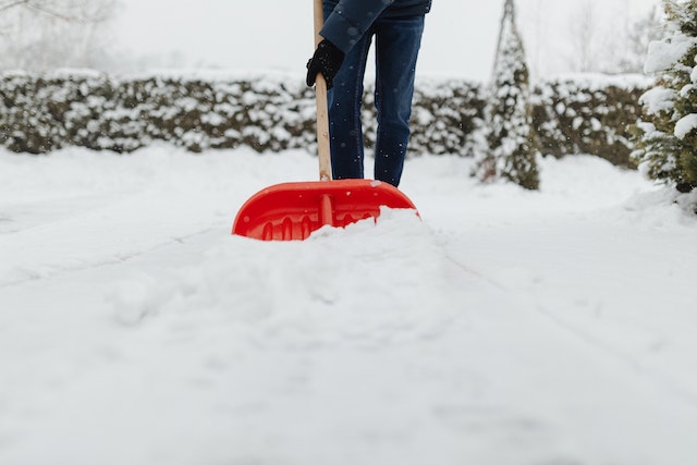 A person shoveling snow