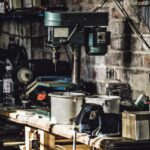 A cluttered workbench in a garage
