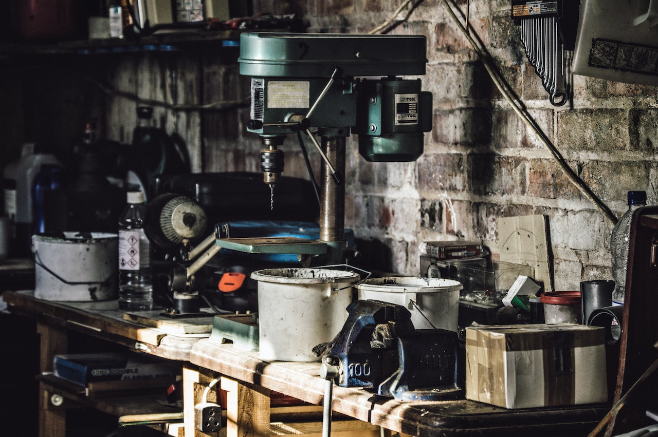 A cluttered workbench in a garage