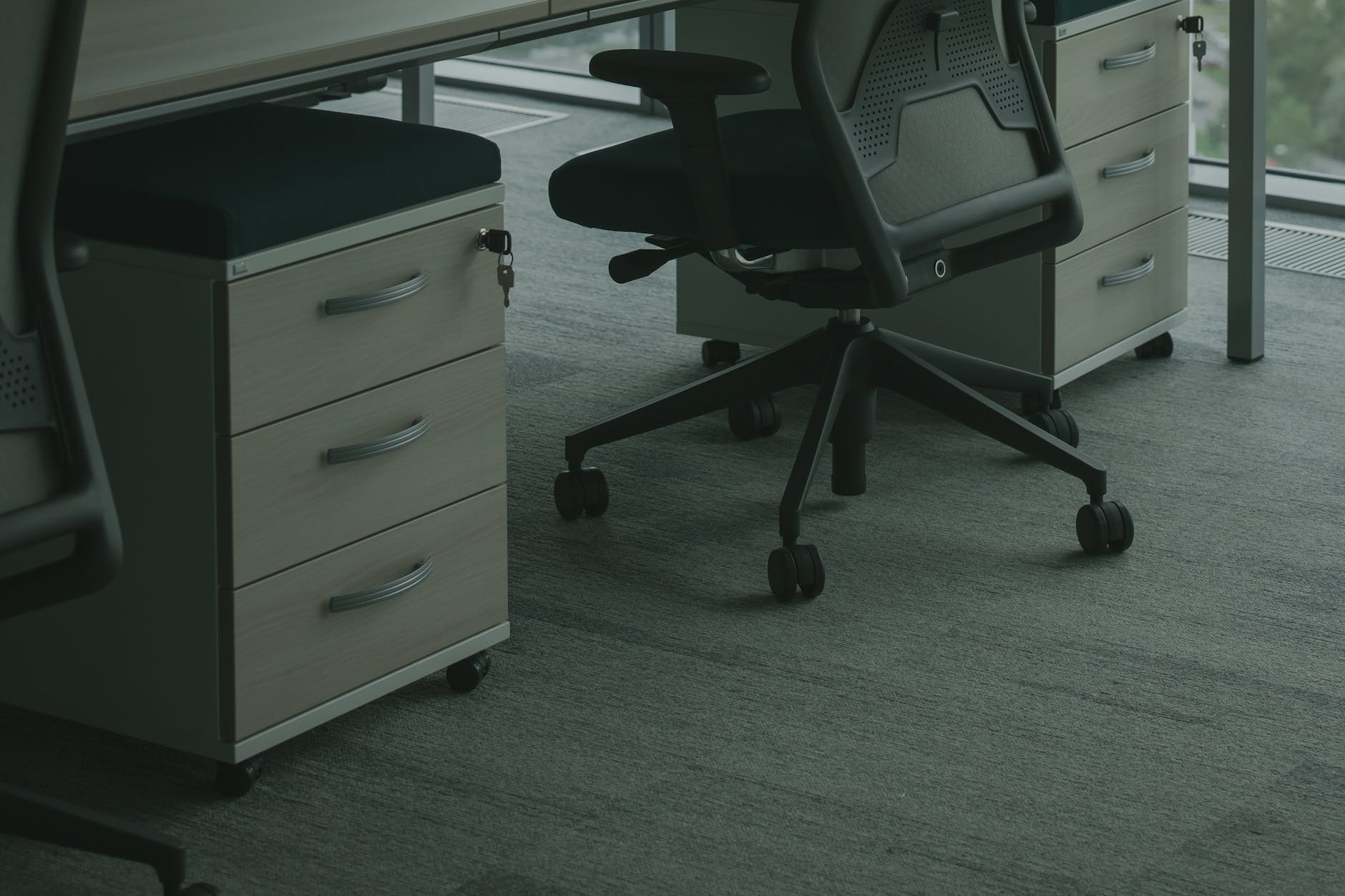 black rolling chair inside the office