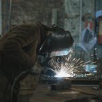 a person welding at a workshop