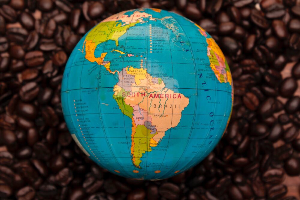 7 Reasons to Consider Moving to South America 1 coffee beans around south america on globe