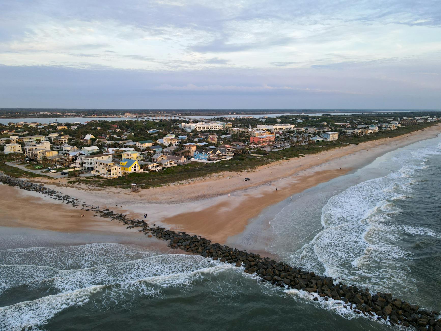 an aerial view of a beach and ocean