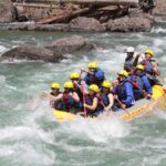 A group of people having fun rafting