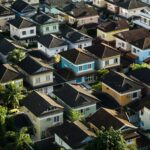 A densely packed neighborhood of homes viewed from above.