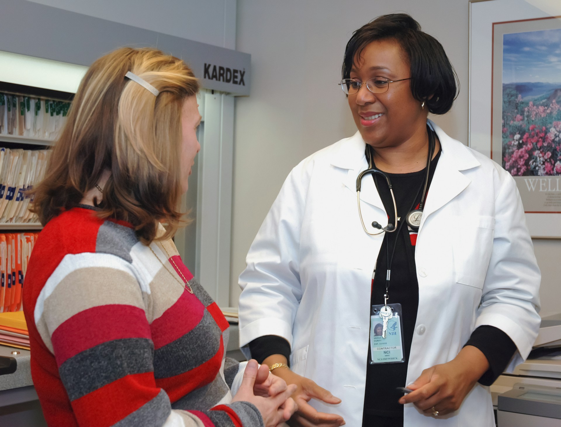 A doctor speaking to their patient.