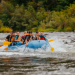 A group of travelers rafting in a river
