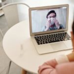 An image of a person on a telehealth appointment.