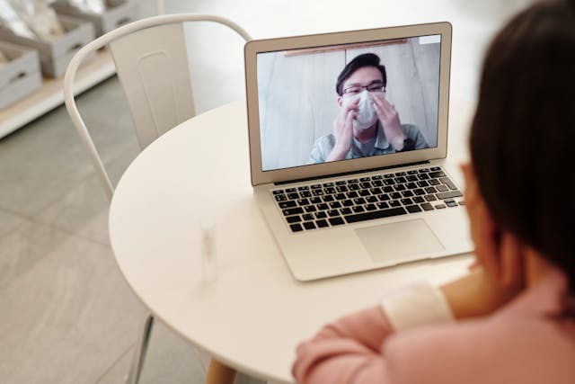 An image of a person on a telehealth appointment.